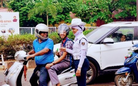 Traffic police distribute chocolates to school students appearing for Board exam